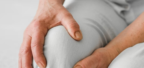 Clinician in a pain management consultation at Gosford Doctors