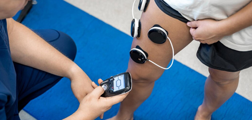 Physiotherapist treating a sports injury at Gosford Doctors